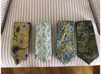 Four Silk Ties Including A Mix Of Floral And Contemporary Designs - Lot #1