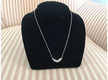Sterling Silver Necklace With Doughnut Shaped Rounds