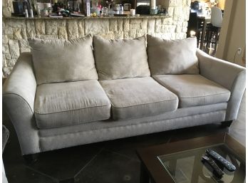 3 Cushion Tan Couch Upholstered With Throw Pillows