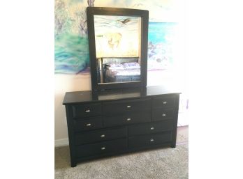 Long Black Ladies Dresser Havng 9 Drawers And Attached Mirror