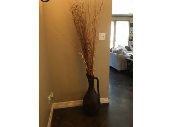 Tall Brown Pottery Urn Style Vase Having Dried Arrangement