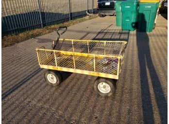 Yellow Utility Cart On Wheels.