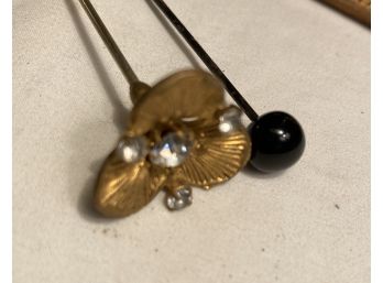 2 Hat Pins A Flower With A Stone In The Middle And One With A Black TopBlack Bead