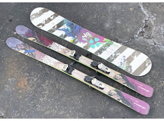 A Snowboard And Skis