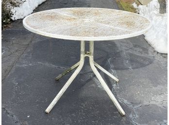 A Vintage Wrought Iron Mesh Top Table
