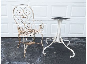 A Vintage Wrought Iron Chair And Table Base
