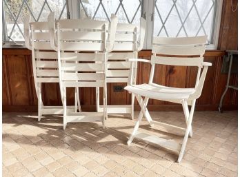 A Set Of 4 Modern Acrylic Folding Chairs By Grosfillex
