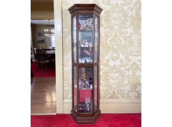 A Wood And Glass Curio Cabinet Filled With Curios!