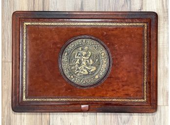 A Vintage Leather Desk Blotter With Inset Brass Medallion Cover