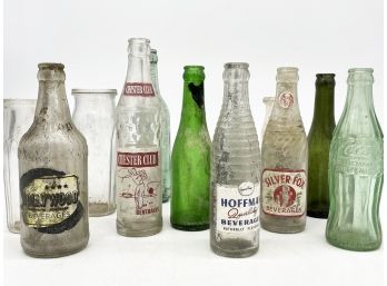 A Collection Of Vintage And Antique Bottles