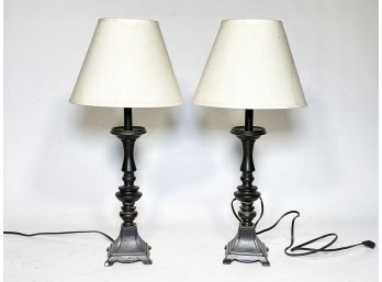 A Pair Of Bronze Tone Stick Lamps