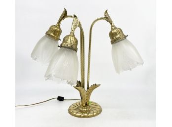 A Vintage Brass And Glass Lamp