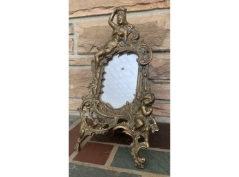Ornate Brass Figural Mirror With Cherub