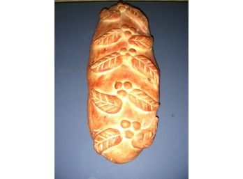 Realistic Sculpture Of A Loaf Of Bread