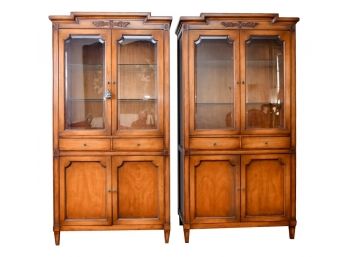 Pair Of Pecan Wood Lighted China Cabinets With Beveled Edge Glass Doors