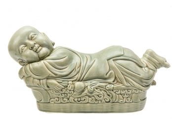 Chinese Ting Ware White Ceramic Pillow In The Shape Of A Child