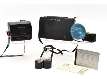 Polaroid Autofocus 660,  Polaroid 101 Camera, Flash Bulbs And Original Cold Clip 193 Instruction Manual