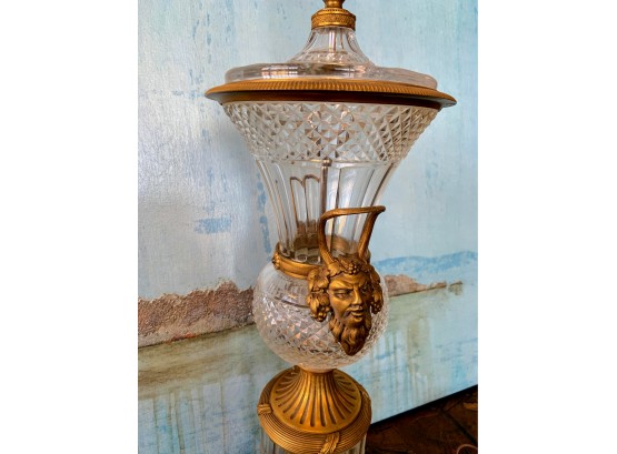 Golden Faces And Crystal Lamp