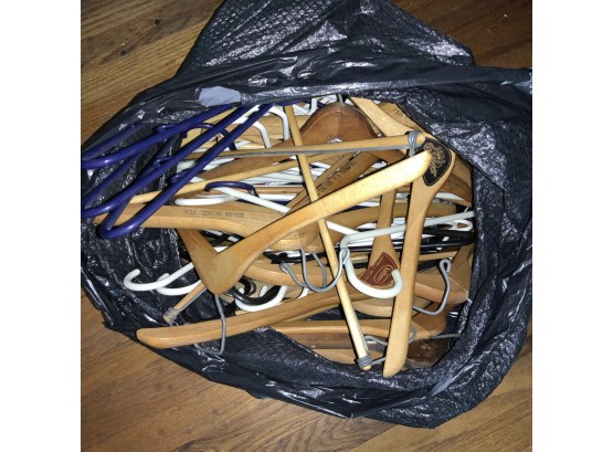 Garbage Bag Full Of Wood & Plastic Hangers