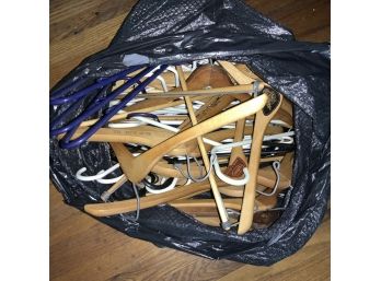 Garbage Bag Full Of Wood & Plastic Hangers