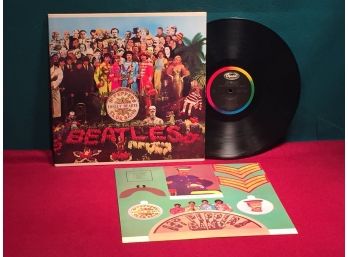 The Beatles. Sgt. Peppers Lonely Hearts Club Band On Capitol Records. Vinyl Is Near Mint With Mint Insert.