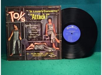 The Toys. Sing 'A Lover's Concerto' And Attack! On Dyno Voice Records. Stereo Vinyl Is Near Mint.