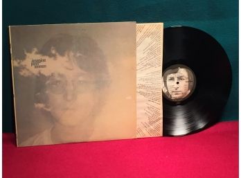 John Lennon Plastic Ono Band. Imagine. Vinyl Is Near Mint. Jacket Is Very Good.