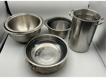 Several Metal Mixing Bowls And Steamer