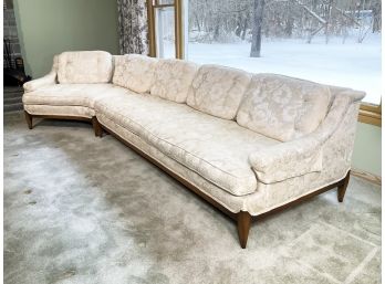 A Mid Century Modern Angled Couch With Matching Mahogany Sofa Table