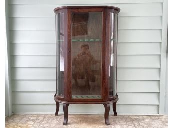 An Antique Curved Glass Cabinet - Repurposed As A Gun Safe