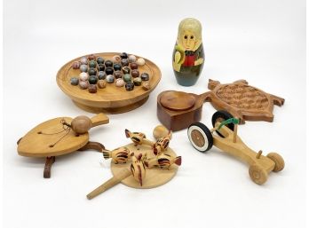 A Grouping Of Vintage Wood Toys And Artwork