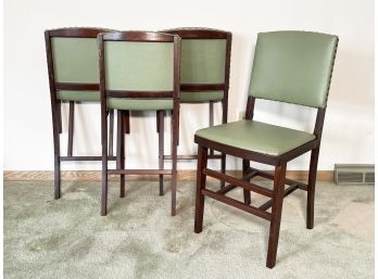 A Set Of 4 Vintage Vinyl Folding Chairs
