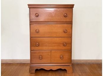 A Mid Century Maple Chest Of Drawers