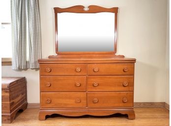 A Mid Century Maple Dresser With Mirror