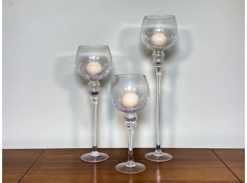 A Glass Candlestick Trio