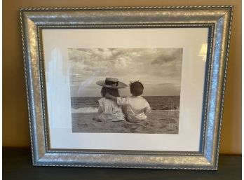 Framed Black & White Print Of Boy And Girl On Beach
