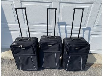 3 Black Rolling Suitcases