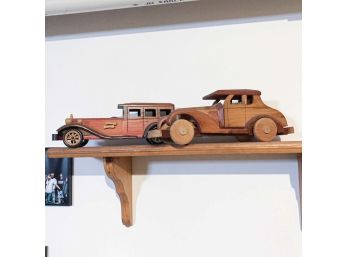 Two Wooden Old Fashioned Cars