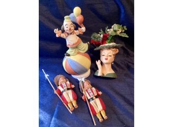 Two Small Dolls Ready For Battle, One Clown Music Box, And A Pretty Lady
