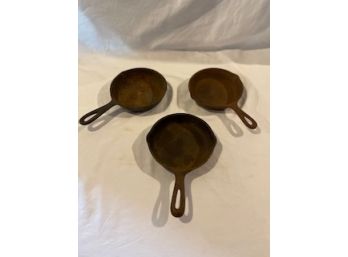 Three Cast Iron Skillets Including One 'wagnerware'.