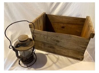 Wooden Crate And Antique Lantern