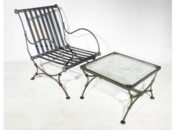 A Vintage Wrought Iron Arm Chair And Glass Top Cocktail Table