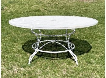 A Large Vintage Tubular Aluminum And Mesh Dining Table