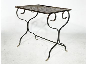 A Vintage Wrought Iron And Mesh Cocktail Table