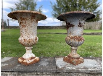 A Pair Of Antique Cast Iron Urns