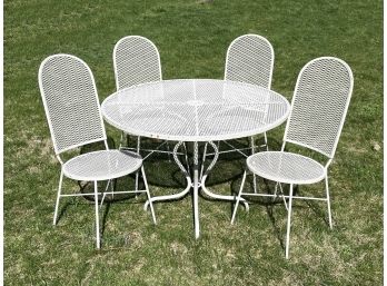A Vintage 1970's Wrought Iron And Mesh Dining Table And Set Of 4 Chairs