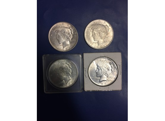 4pcs Peace Silver Dollars . Very Nice Condition