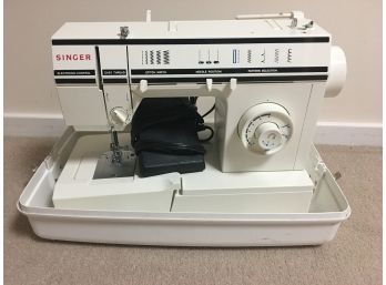 Singer Sewing Machine Measures 15.5x7x11.5 Has Carrying Case