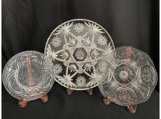 Three Cut Glass Plates - Star, Centre Flower, And Circles