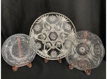 Three Cut Glass Plates - Star, Centre Flower, And Circles